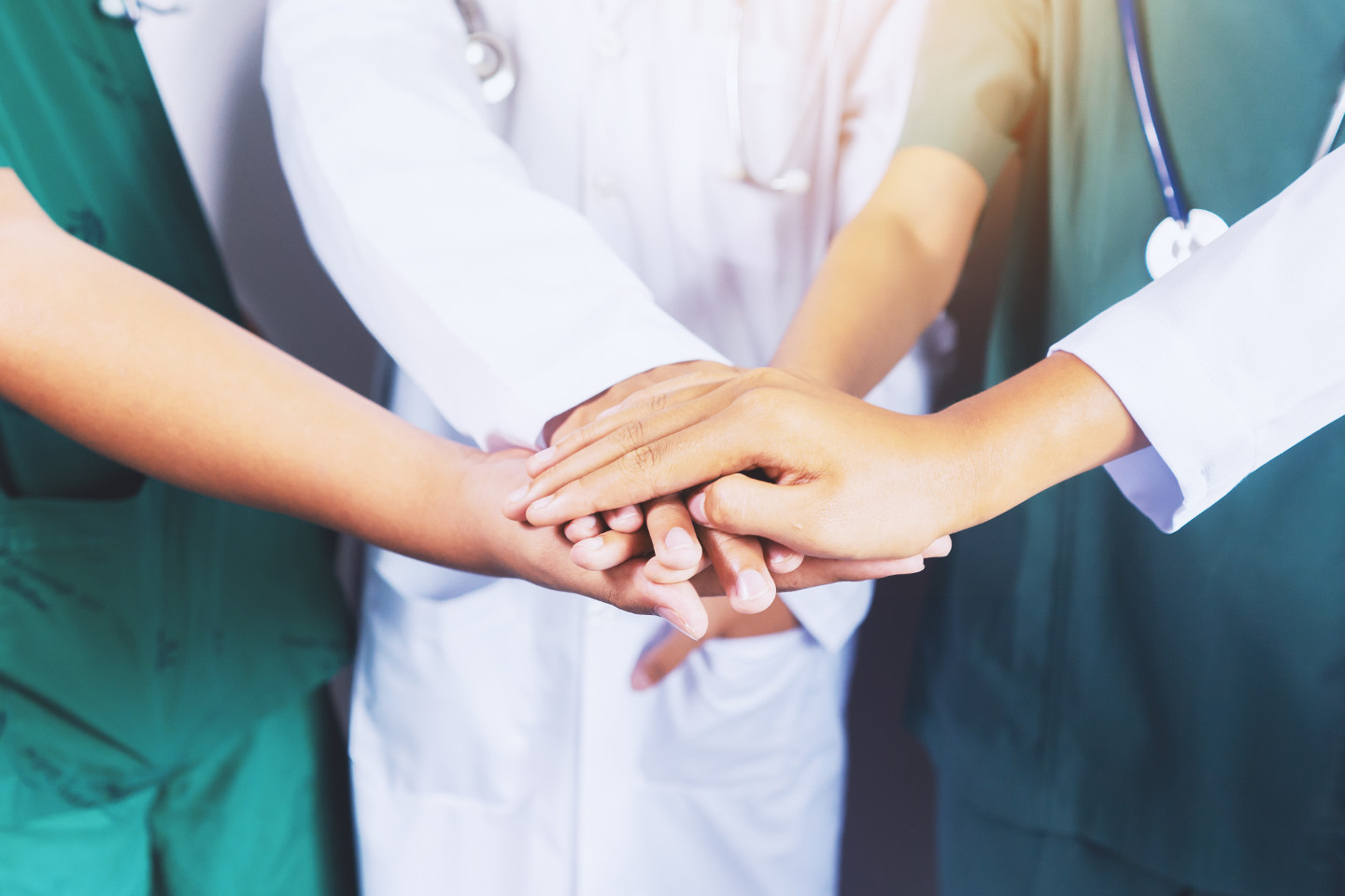 Doctor and nurse coordinate hands. Concept Teamwork, happy doctors working together as team for motivation, success medical health care