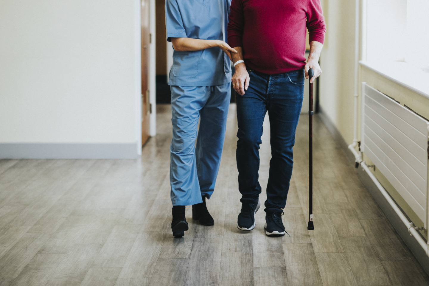 Physiatrist training a patient to walk again